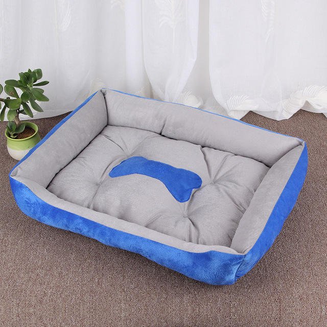 Snuggle Cuddler Dog Bed — Cotton-Filled with Raised Bolster Arms, Machine Washable & Dryer Safe