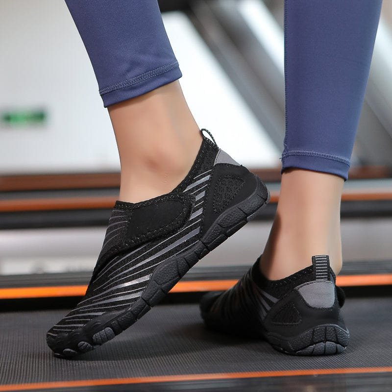 Solyn Slip-On Athletic Shoes in Black — Breathable Mesh, Low-Profile Sole