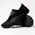 Solyn Slip-On Athletic Shoes in Black — Breathable Mesh, Low-Profile Sole