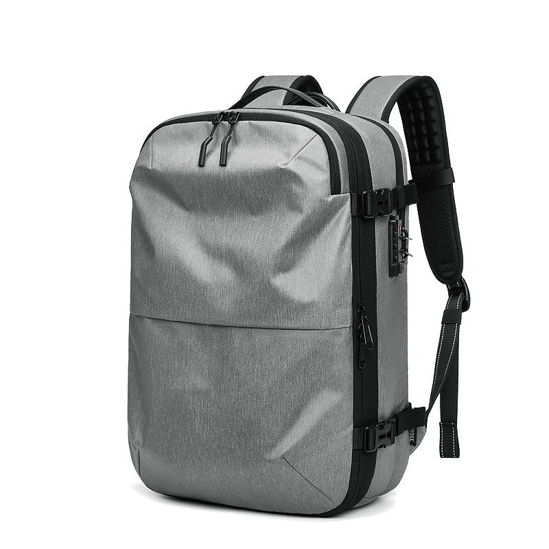 Vacuum Compression Travel Backpack — Water-Resistant Oxford, Anti-Theft Lock, Fits 17" Laptop