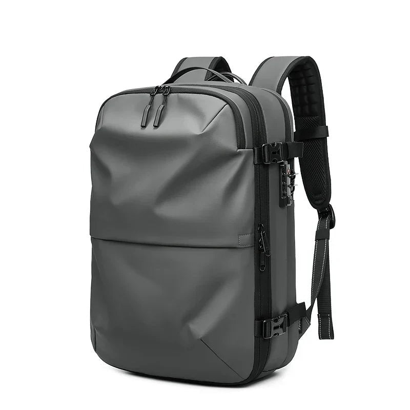 Vacuum Compression Travel Backpack — Water-Resistant Oxford, Anti-Theft Lock, Fits 17" Laptop
